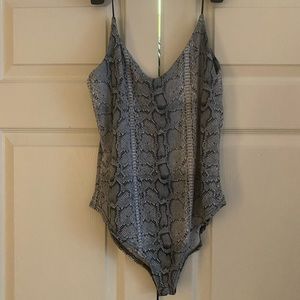 Grey snake print body suit